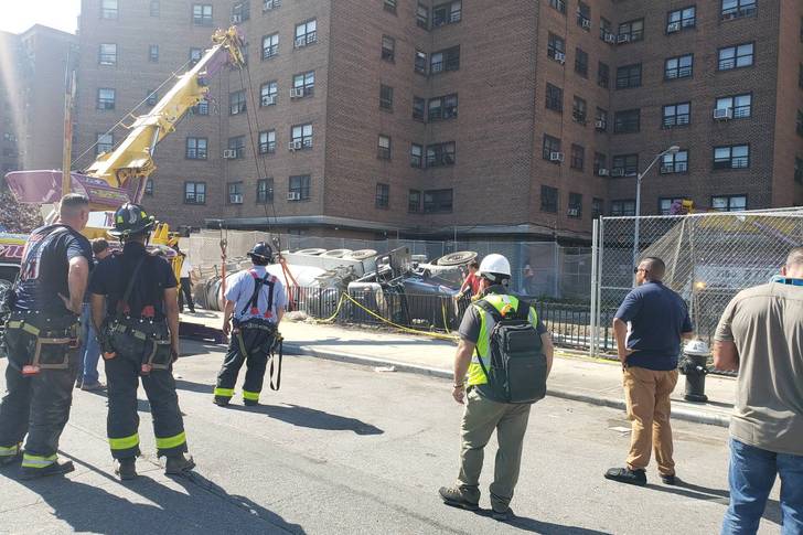 The fallen cement truck outside the Baruch Houses